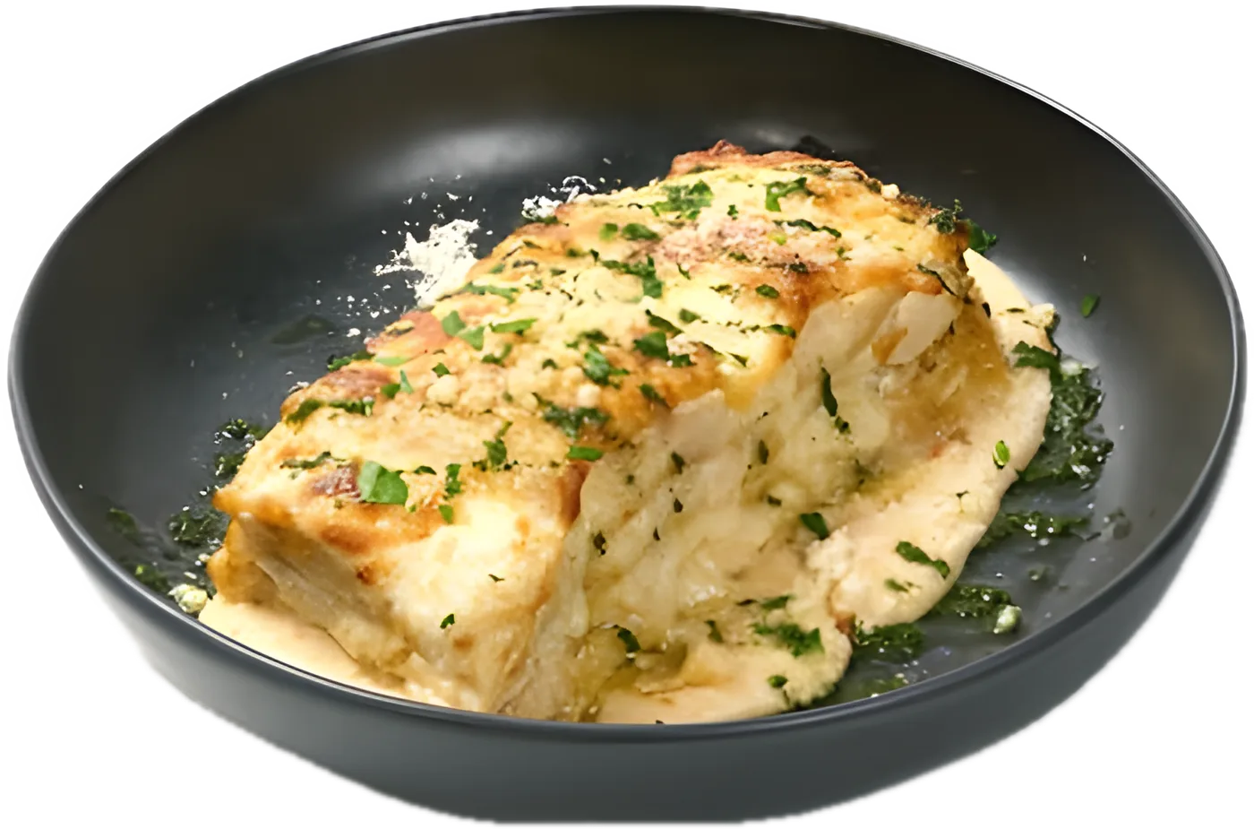 Chicken Lasagna in white sauce with mozzarella and parmesan, in a black bowl