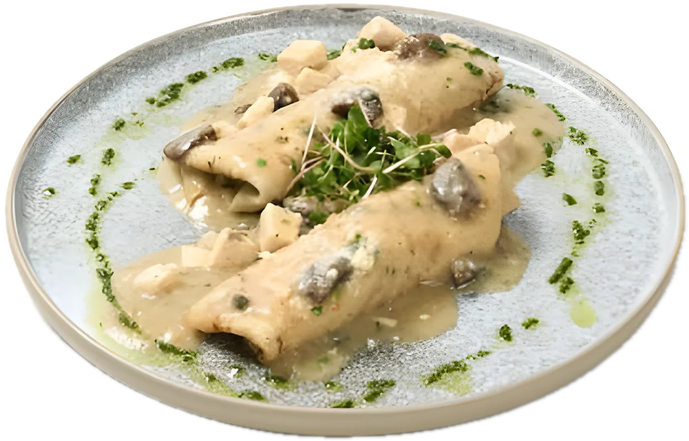 Chicken & Mushrooms Crepes in creamy gravy with parmesan and parsley oil, on a grey plate